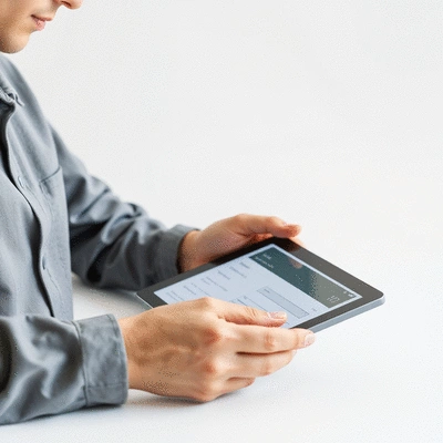 User submitting online form on tablet